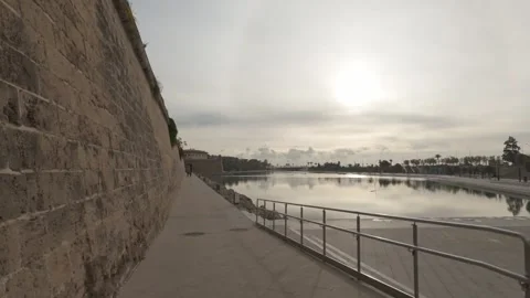 Sunrise Panorama of Parc de la Mar and Ancient City Walls in Palma de Mallorca Video stock 324900893