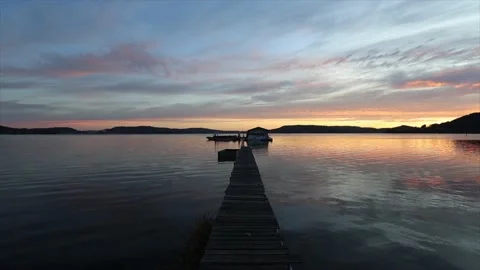 Sunrise on the pier by the lake Stock Footage 234616936