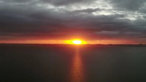 Sunrise pull back over lake Stock Footage 186144222