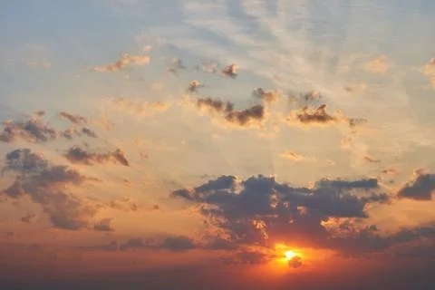 Sunrise with rays breaking through the clouds Stock-Fotos