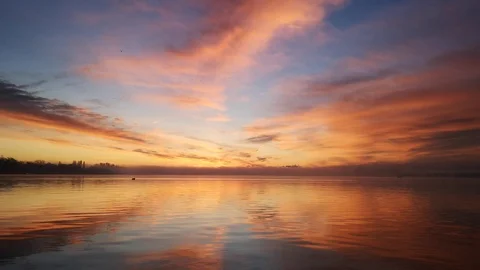 Sunrise with red clouds lake constance Stock Footage 121934900