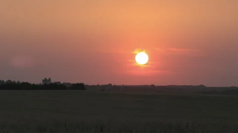 Sunrise on red sky - countryside scene background time-lapse Stock Footage