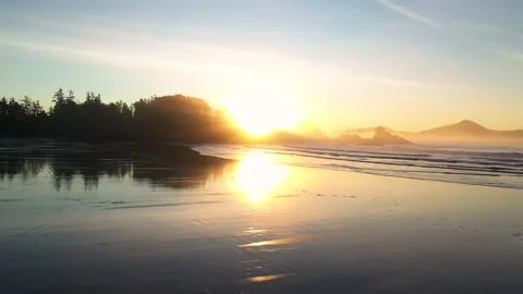 Sunrise Reflecting Off Of Sand At The Beach 스톡 동영상 168316460