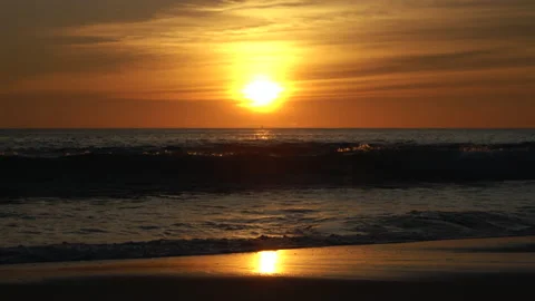 Sunrise reflection on the beach Stock Footage 155728037