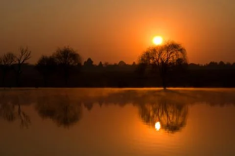 Sunrise reflection Stock Photos