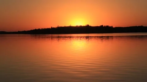 Sunrise reflection in water (HD) k Stock Footage 955036