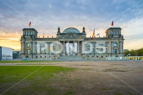 Sunrise at the Reichstag Building a historic edifice in Berlin, Germany Stock Photos