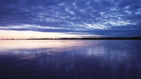 Sunrise at the river in cloudy day Stock Footage 130863323