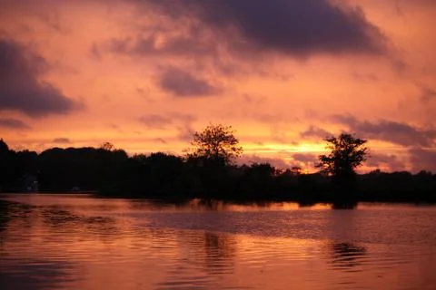 Sunrise on a river Фото