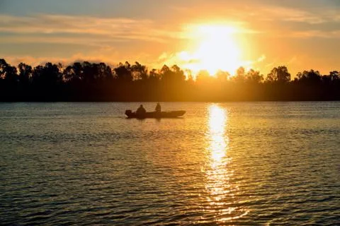 Sunrise on the river Stock Photos