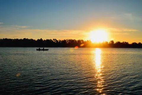 Sunrise on the river Stock Photos