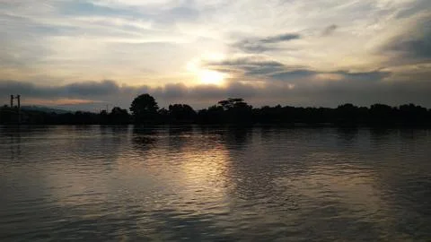 Sunrise on the river Stock Photos