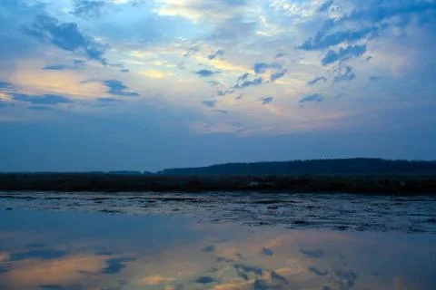Sunrise on river Stock Photos