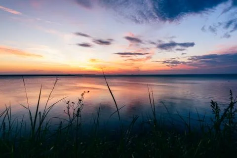 Sunrise on river Stock Photos
