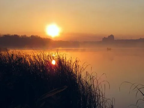 Sunrise on the river Stock Photos