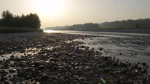 Sunrise on a river with reflection on water. Stock Footage 85035805