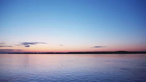 Before sunrise at the river with some clouds 2 Stock Footage 130456232