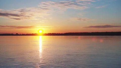 Sunrise at the river with some clouds 3 Vídeo Stock 130456548