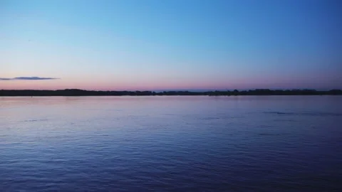 Before sunrise at the river with some clouds 4 動画素材 130456183