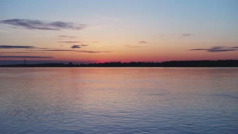 Before sunrise at the river with some clouds 5 Stock Footage 130456233