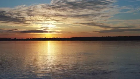 Sunrise at the river with some clouds 5 Stock Footage 130456556
