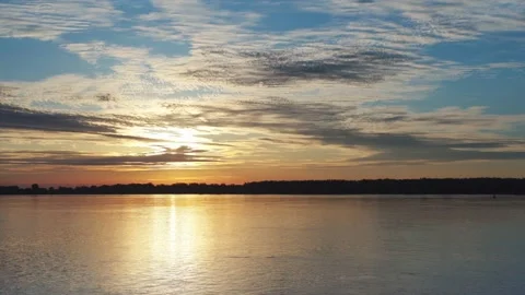 Sunrise at the river with some clouds 9 Vídeo Stock 130456715