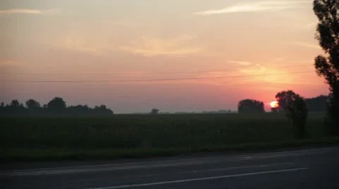 Sunrise on the road Stock Footage 12432305