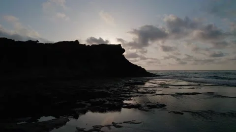 Sunrise on the rocky seashore. Video stock 159124722