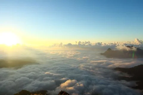 Sunrise scene with the peak and cloudscape at phu chi fa in chiangrai,thailan Stock Photos