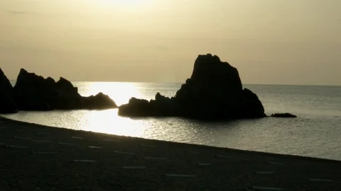Sunrise on the sea with cliff Stock Footage 77248240