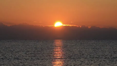 The sunrise from the sea Stock Footage 143583131