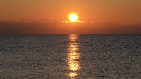 The sunrise from the sea Stock Footage 143583148