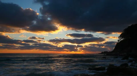 Sunrise at sea with large clouds and rays Stock Footage 45838108
