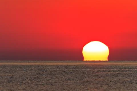Sunrise at sea Stock Photos