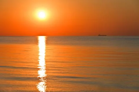 Sunrise at sea Stock Photos