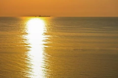 Sunrise at sea Stock Photos