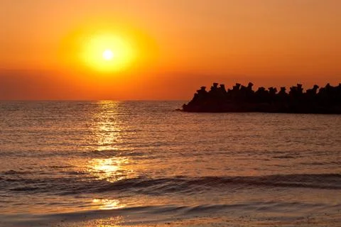 Sunrise at sea Stock Photos