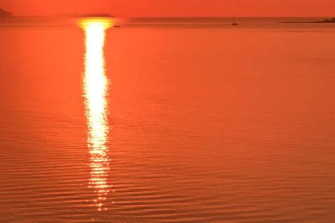 Sunrise at sea Stock Photos