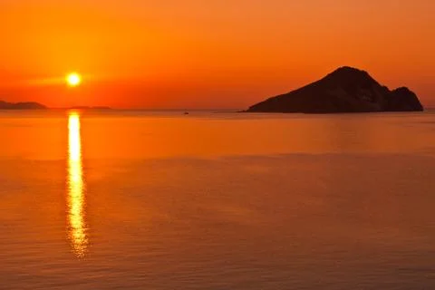 Sunrise at sea Stock Photos