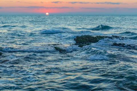 Sunrise on the sea Stock Photos
