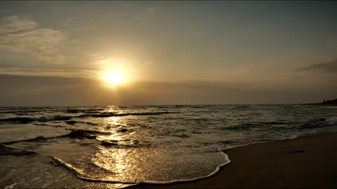Sunrise on the seashore, waves Stock Footage 205685923