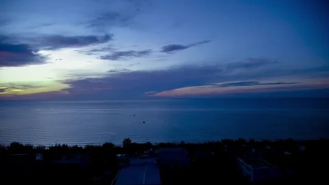 Sunrise on the seaside with beautiful cloudy sky. Stock Footage 79602827