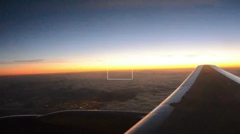 Sunrise seen from airplane Stock Footage 10833749