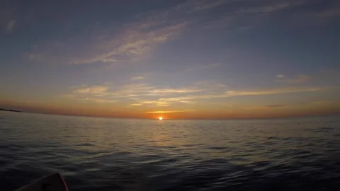 Sunrise seen from the surf Stock Footage 185981515