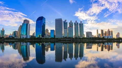 Sunrise Silhouette Building and Reflection On Water 4K Time Lapse (pan up) Stock Footage 80286629