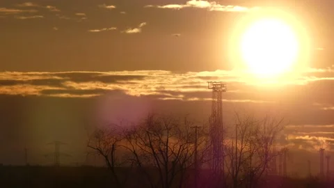 Sunrise sky, real time - 4/4 - power poles, wind turbines, trees, flying birds Stock Footage 151900960