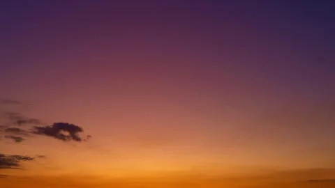 Sunrise Sky timelapse. Moving clouds and sunset. Clouds float through the Stock Footage 311556816