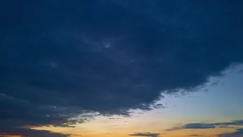 Sunrise Sky timelapse. Moving clouds and sunset. Clouds float through the Stock Footage 315621026