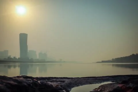 Sunrise Sky view background behind capital gate tower of Abu Dhabi, Skyscrape Stock Photos