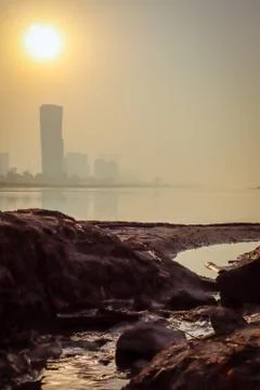 Sunrise Sky view background behind capital gate tower of Abu Dhabi, Skyscrape Stock Photos